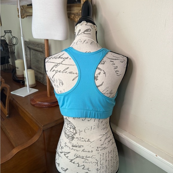 Nike Sports Bra Dri Fit with Racerback Design Moisture Wicking Choose Color - Picture 8 of 8